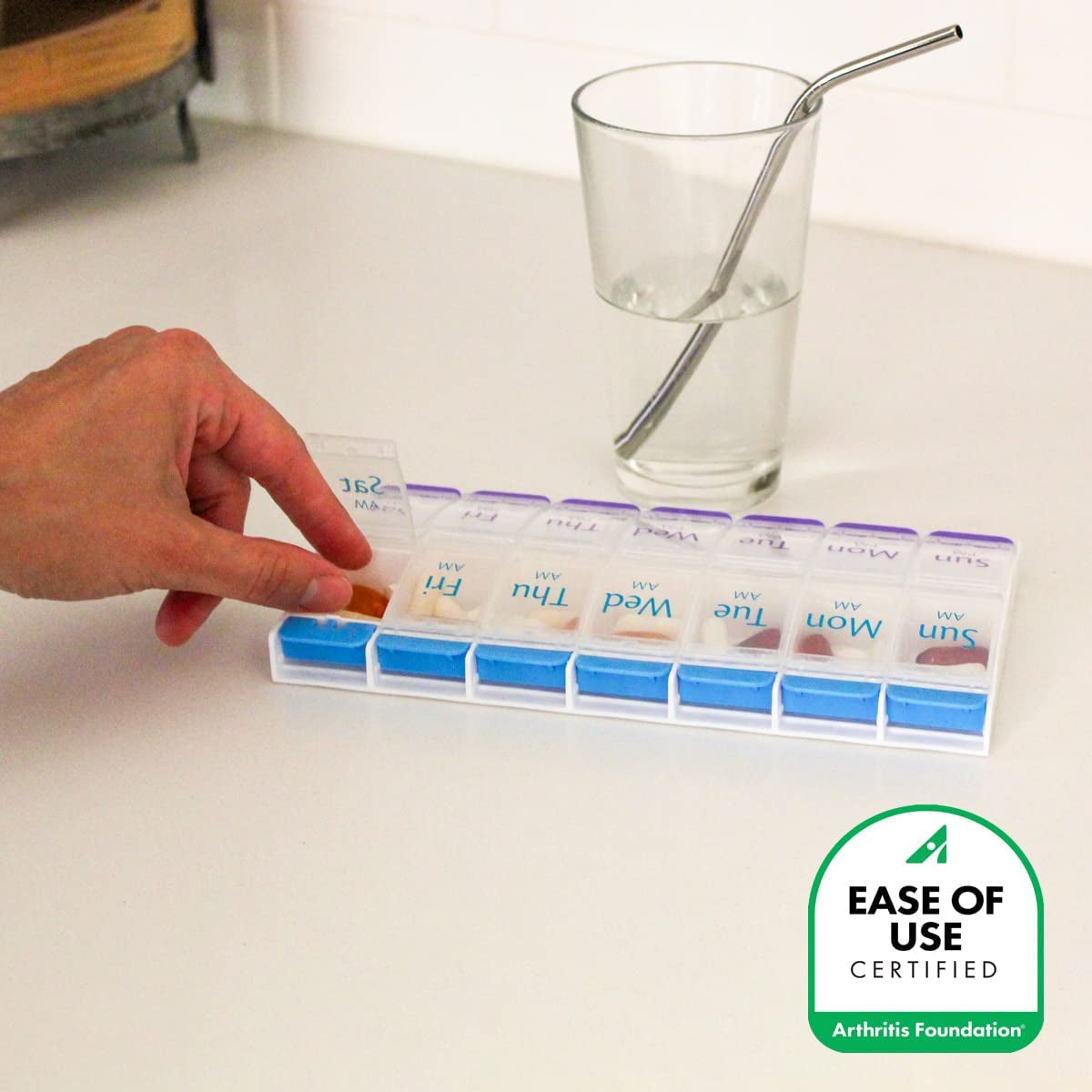 Push Button (7-Day) Pill Case - Organizes Medicine and Vitamins - 2 Times a Day AM/PM Slots - Large Compartments - Designed for Arthritis-Friendly Use - Features Clear Lids in Purple/Blue Color.