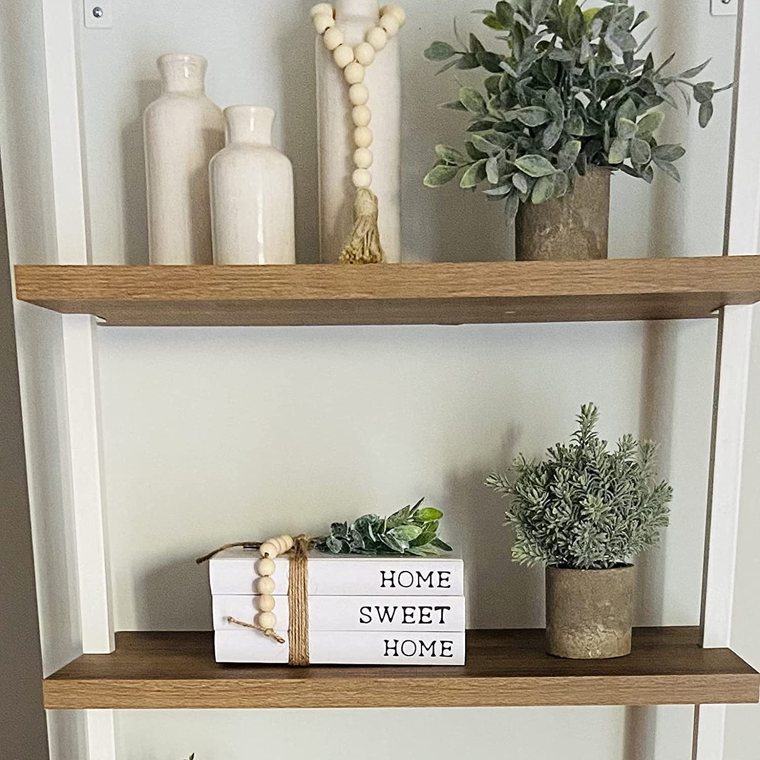Set of 3 Decorative White Hardcover Books - These Farmhouse Stacked Books are perfect for decorating coffee tables and shelves. They spell out "Home Sweet Home" and add a charming touch to your decor.