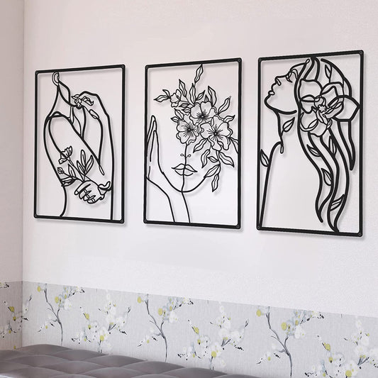 Set of 3 Metal Minimalist Abstract Woman Wall Art - These Line Drawing Wall Art pieces feature single line female figures. They make stylish home decor for the kitchen, bathroom, and living room. Color: Black. Design: Flower.