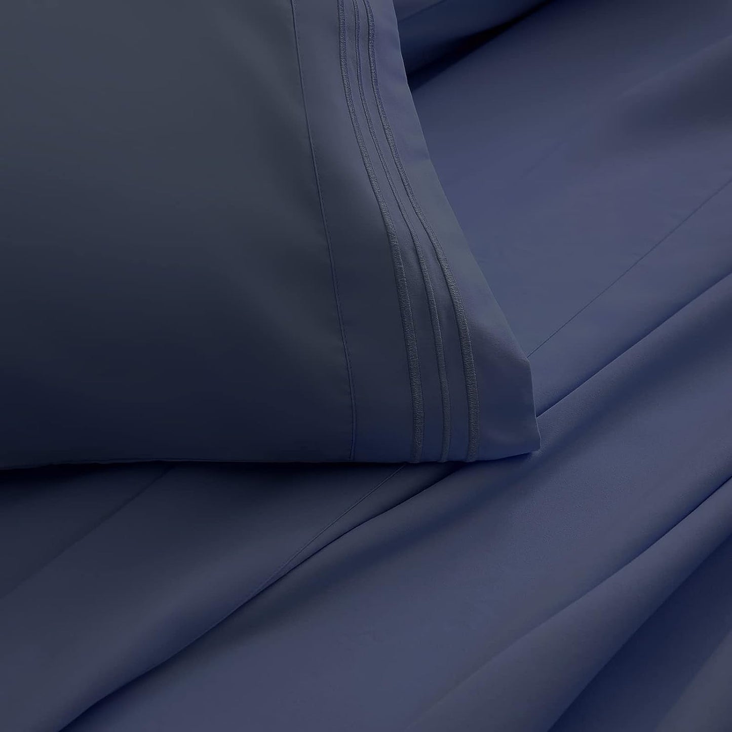 Queen Size Bed Sheets Set - Includes 1 Flat Sheet, 1 Fitted Sheet with a 16-Inch Deep Pocket, and 2 Pillowcases. Made from Super Soft Microfiber with a 1800 Thread Count. These Beddings are Wrinkle-Free and Resistant to Shrinkage. Color: Navy Blue.
