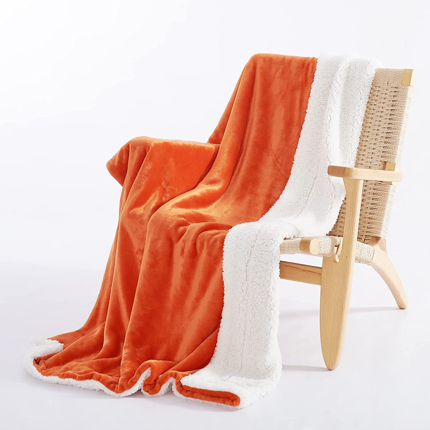 Kids Sherpa Fleece Throw Blanket for Couch - A Winter Warm, Fuzzy, and Soft Blanket measuring 50 inches x 60 inches. It's Velvet Reversible and offers a Luxurious feel. Ideal for home, bed, and school use, and comes in an attractive Orange color.