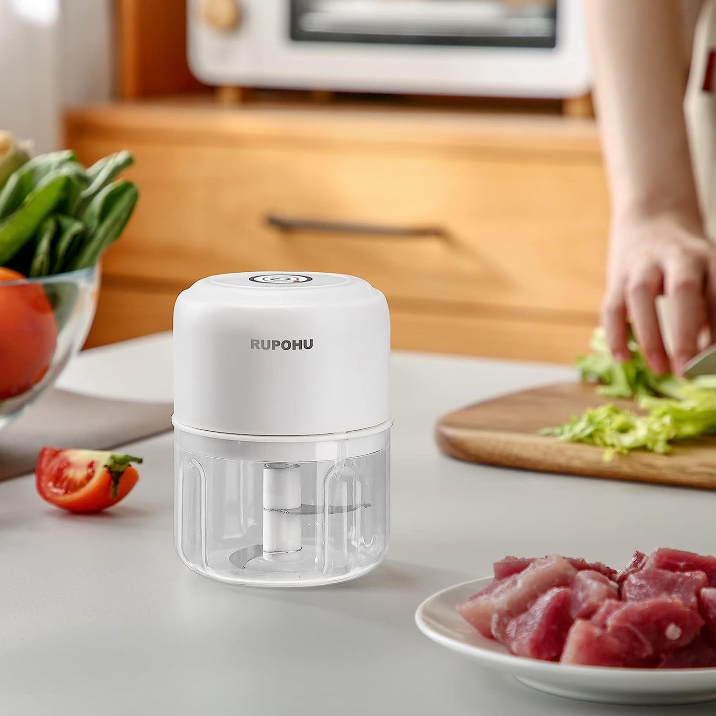 White Electric Garlic Chopper: Mini Portable Veggie Chopper with a 250ML+100ML capacity, suitable for grinding and mashing garlic, onions, ginger, chili, fruit, meat, and more. It's a wireless food processor ideal for various kitchen tasks.