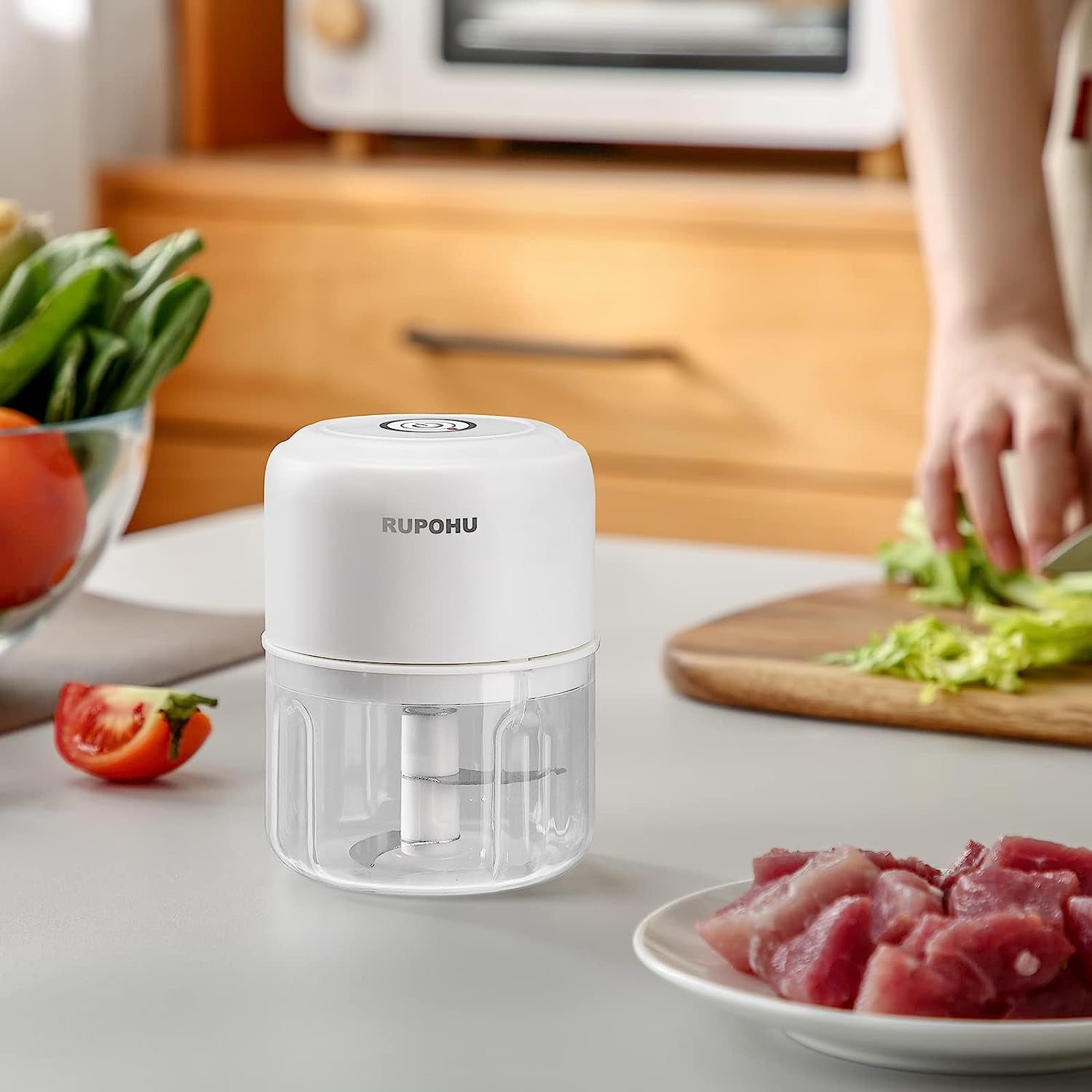 White Electric Garlic Chopper: Mini Portable Veggie Chopper with a 250ML+100ML capacity, suitable for grinding and mashing garlic, onions, ginger, chili, fruit, meat, and more. It's a wireless food processor ideal for various kitchen tasks.