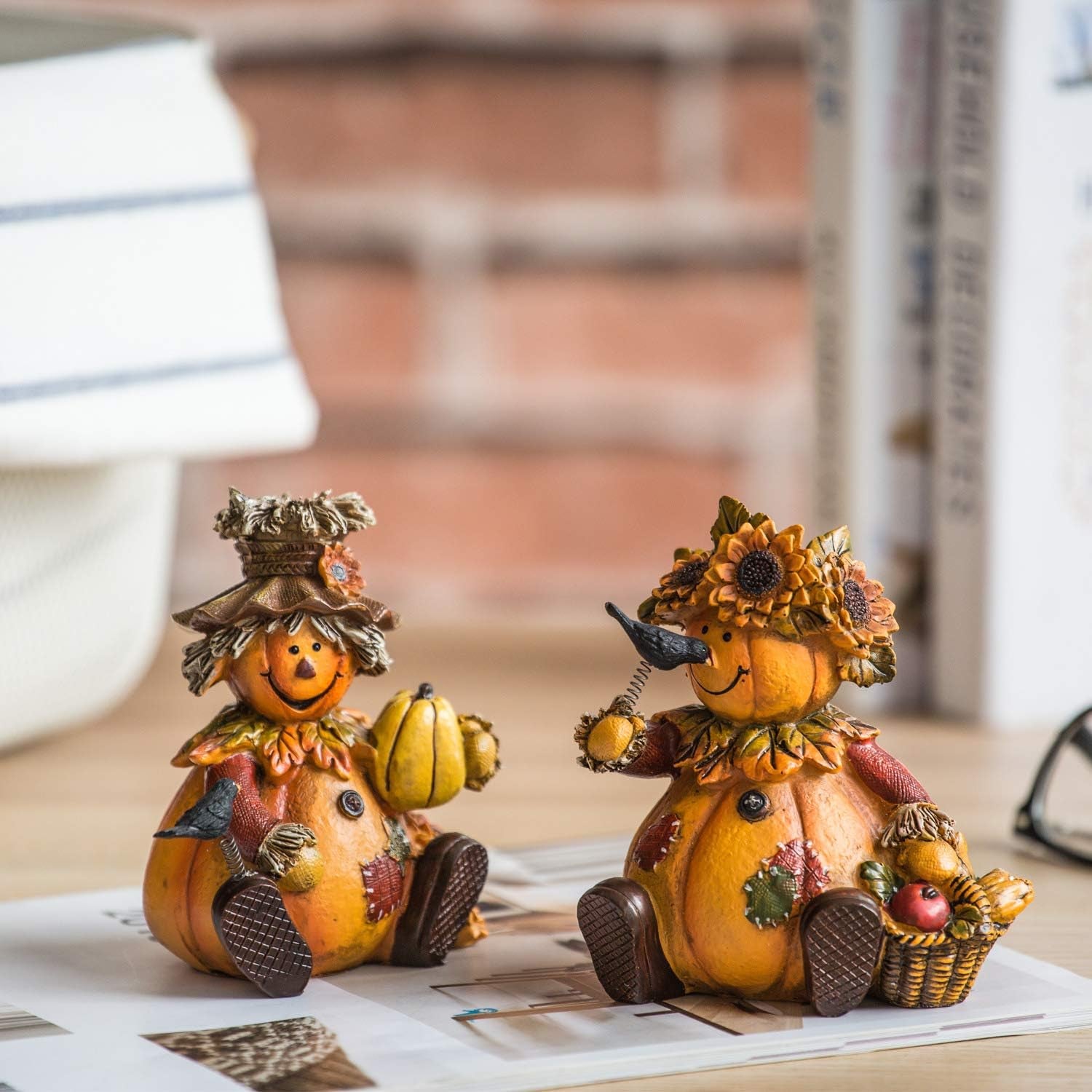 Set of 2 Polystone Table Decor Fall Harvest Statues - These Pumpkin People Dolls are perfect for adding a seasonal fall accent to your home decor.