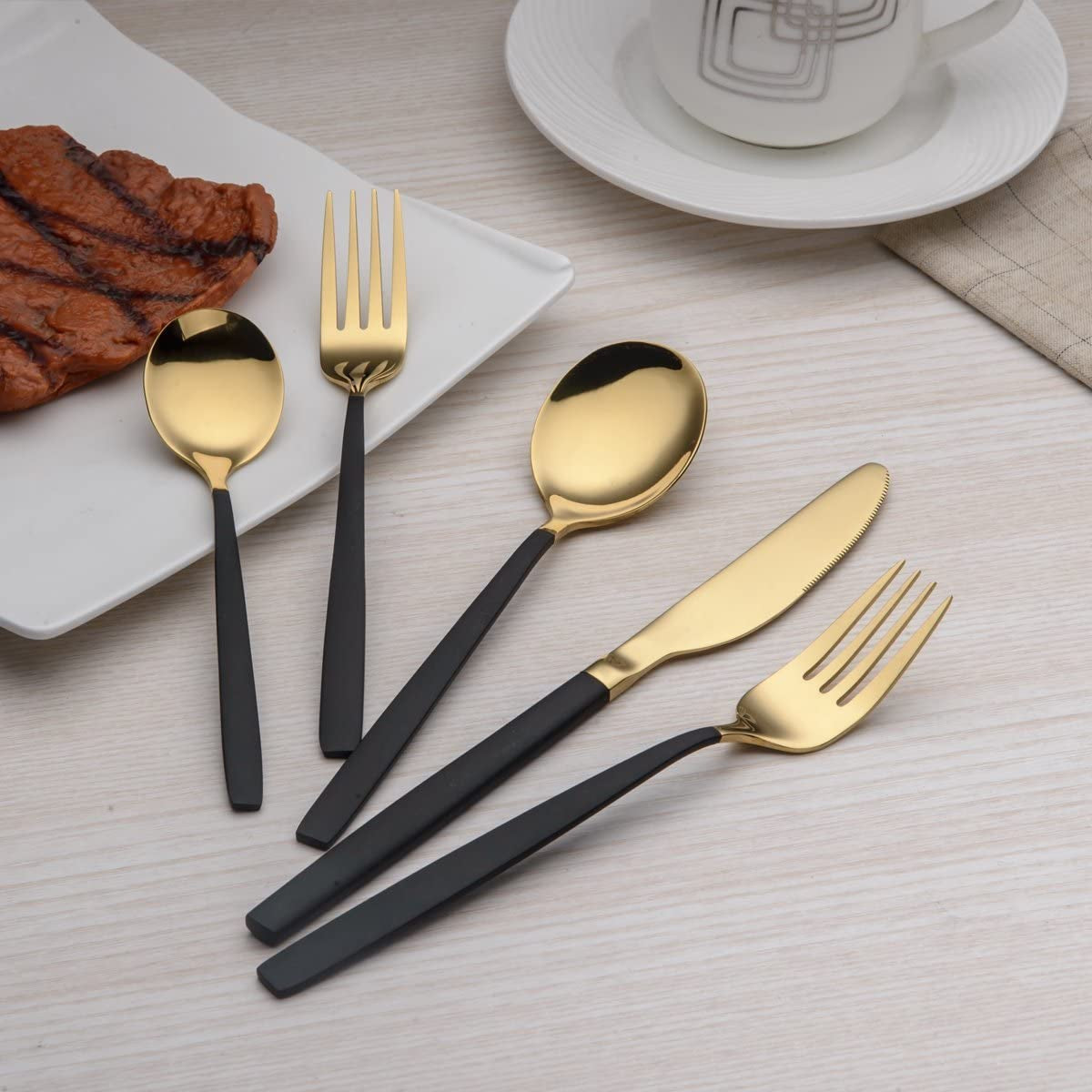  Black and  Golden 20-Piece Titanium-Plated Stainless Steel Flatware Set - Features Black Handles with Golden Accents, Providing a Unique and Elegant Black and Golden Cutlery Set for Service for 4.