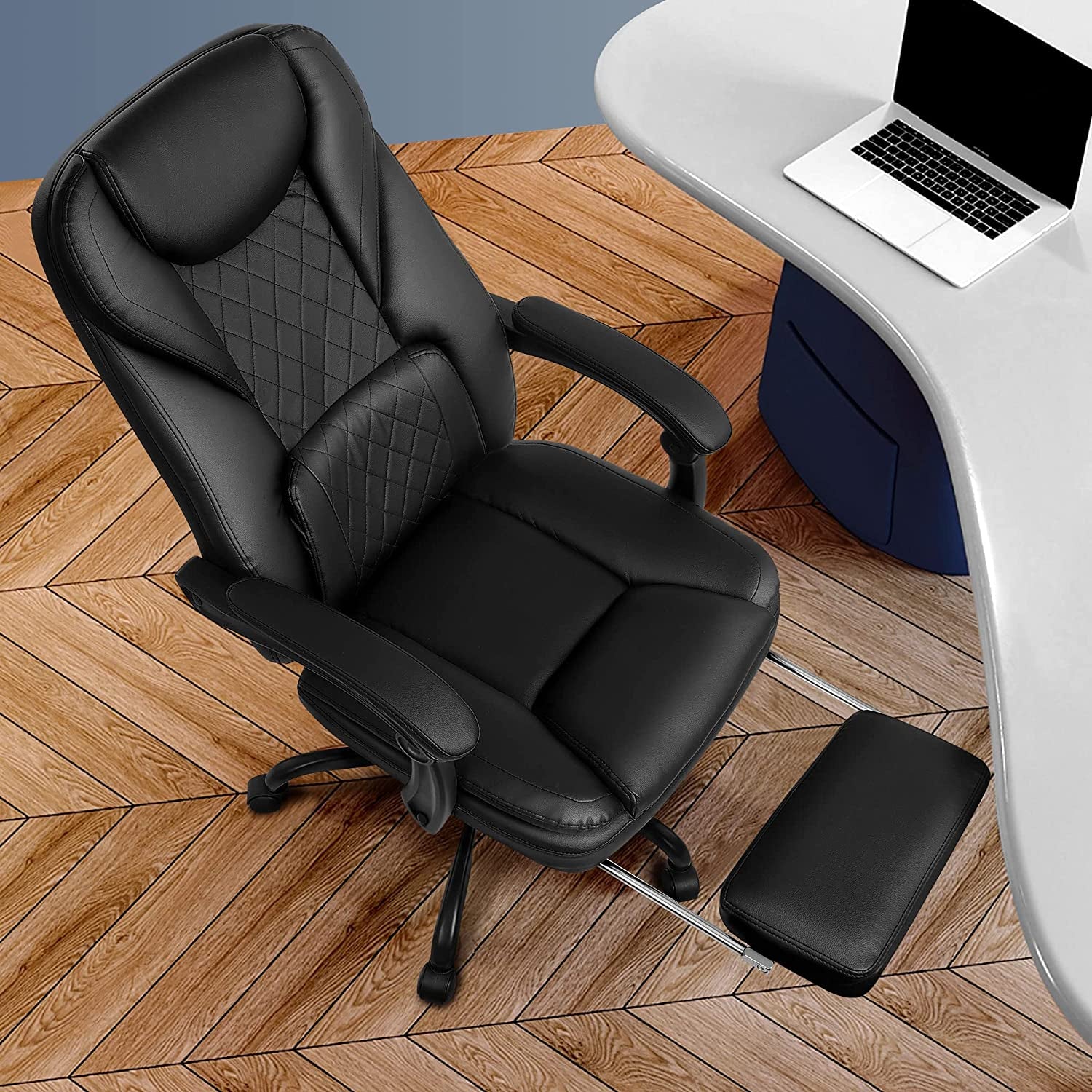 Executive Office Chair for Big and Tall Individuals - Features a Reclining Leather Chair with a Footrest, High Back, Lumbar Support, Ergonomic Design, and Padded Armrests, Suitable for Home Office Use. Available in Black.