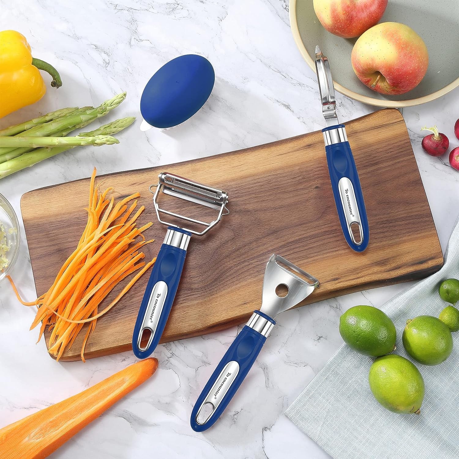 Kitchen Gadget Set of 4: Stainless Steel Vegetable Peelers with Ultra Sharp Blades, Ergonomic Handles, and Cleaning Brush for Added Convenience.