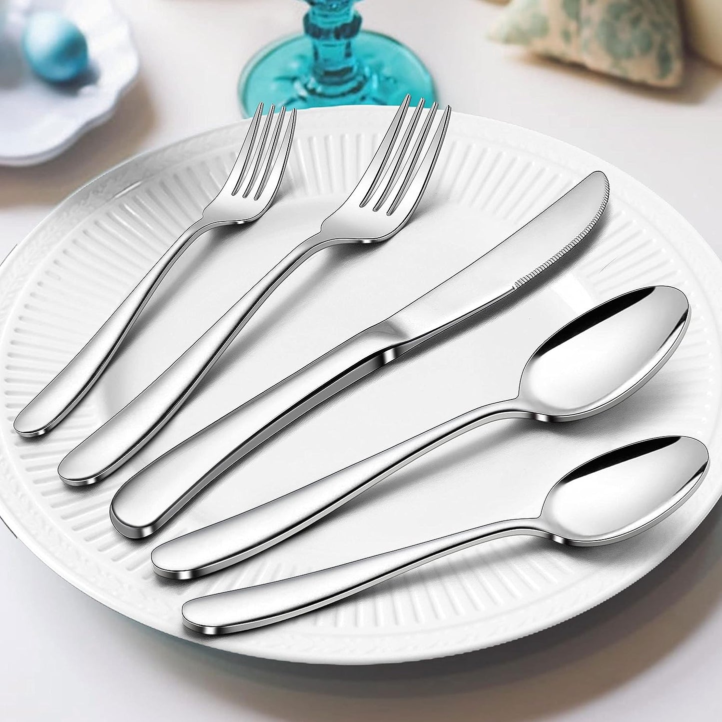 40-Piece Heavy Duty Stainless Steel Silverware Set: Modern Flatware Cutlery Set for 8. Fancy Tableware Eating Utensils Set for Home Wedding. Dishwasher Safe with Mirror Finish.