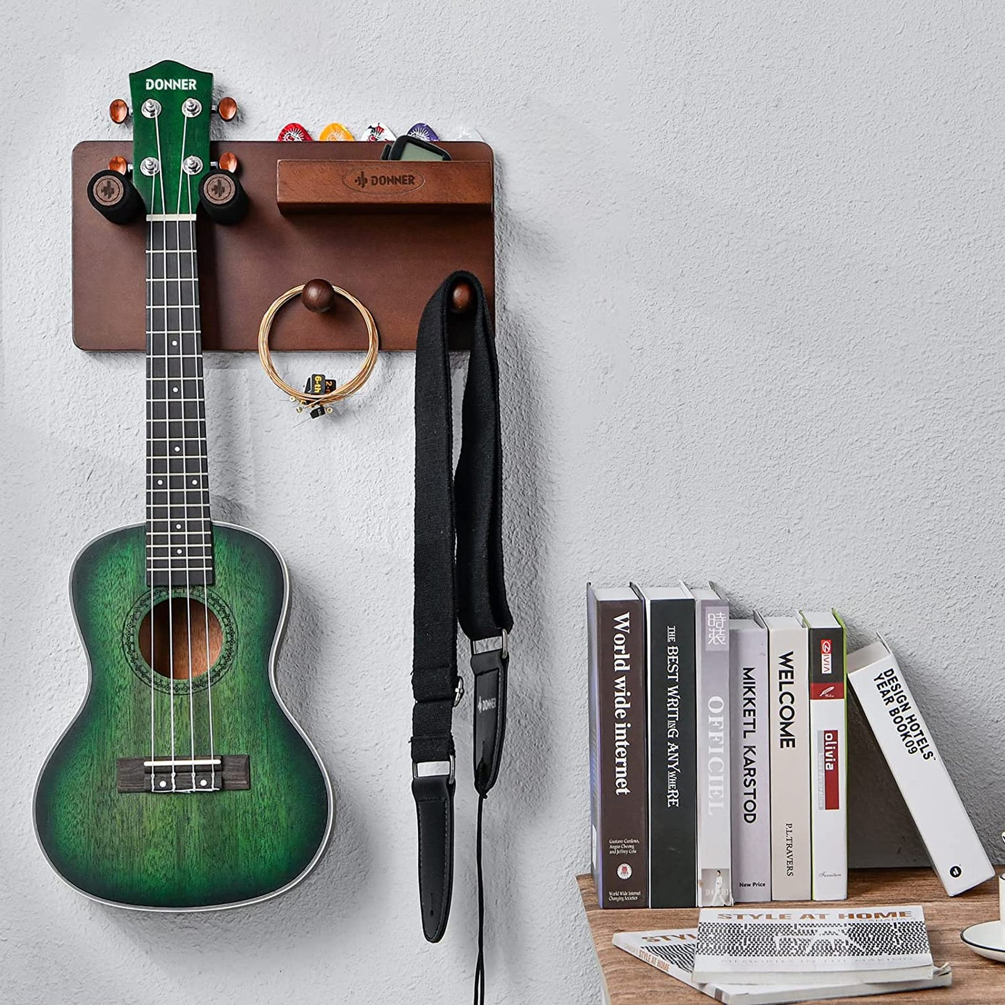 Guitar Wall Mount Shelf - This Guitar Wall Hanger comes with a Storage Shelf, Pick Holder, and 2 Hooks. It's designed for securely hanging Electric Guitars, Acoustic Guitars, Bass Guitars, and Guitar Accessories while also providing storage space.