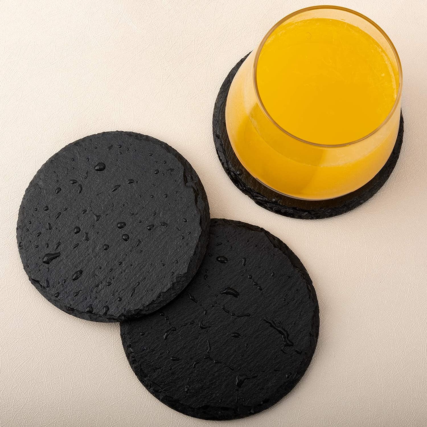 Set of 8 Eco-Friendly Round Slate Drink Coasters with Holder - Perfect for Drinks at Bars and Home. These Slate Stone Coasters are 4 inches in diameter and come in Black.